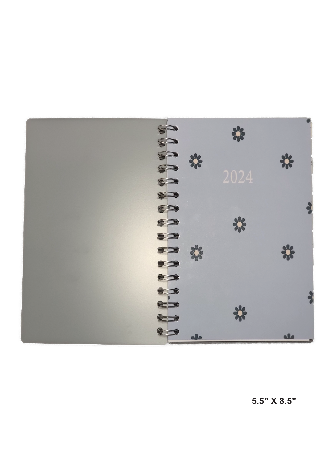 Image of a hand-made 5.5" x 8.5" 12-month planner with blue flowers and light blue background cover. Great for planning and organization. 