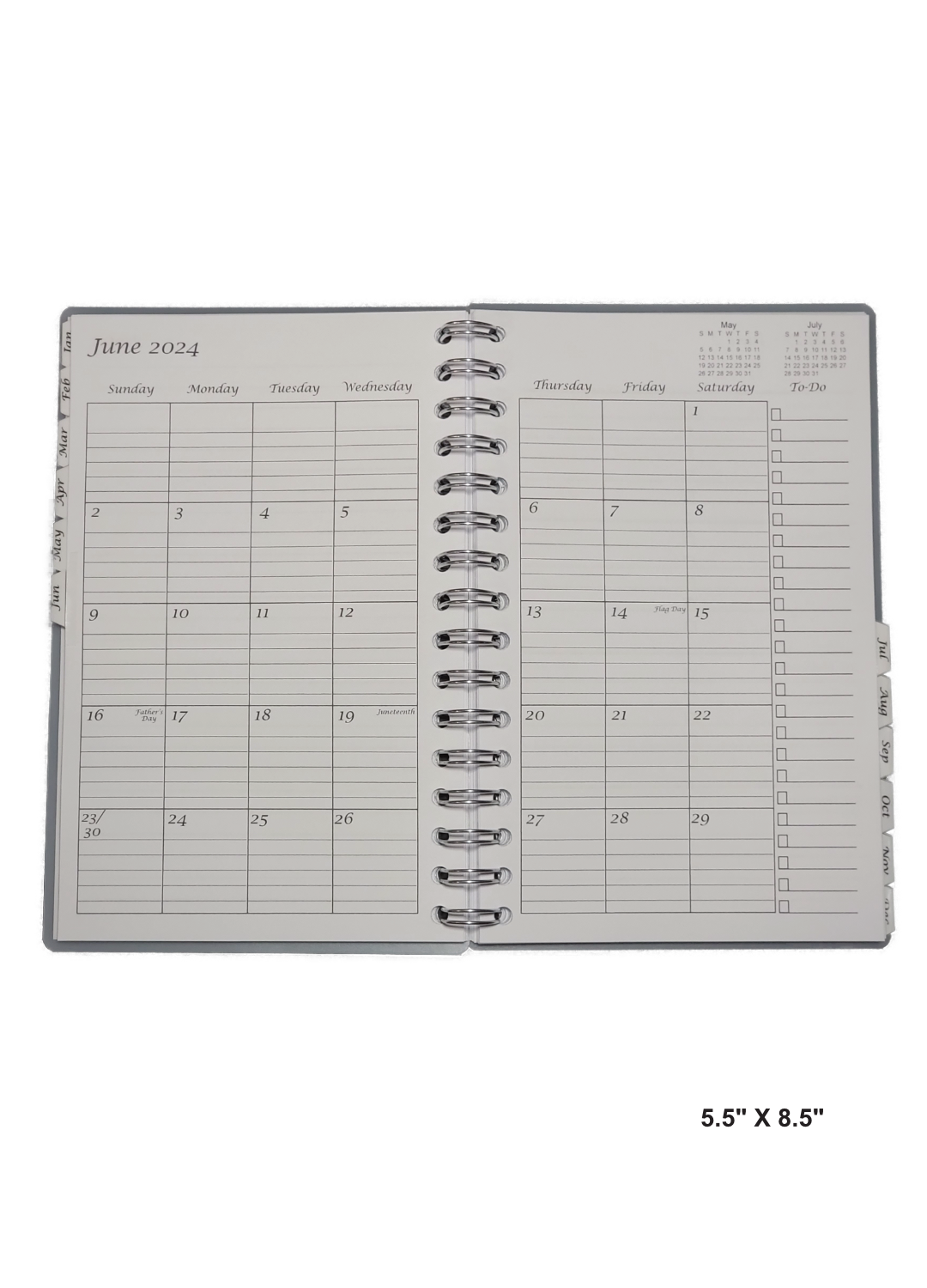 Inside view of a 5.5" x 8.5" hand-made 12 month planner with a clean and organized layout. Each month has dedicated pages with ample writing space and clear headings. A practical and visually appealing tool for staying organized.