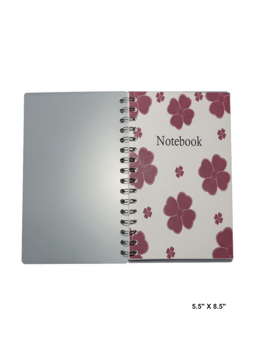 A 5.5" x 8.5" notebook with red flowers. Perfect for note taking or journaling.