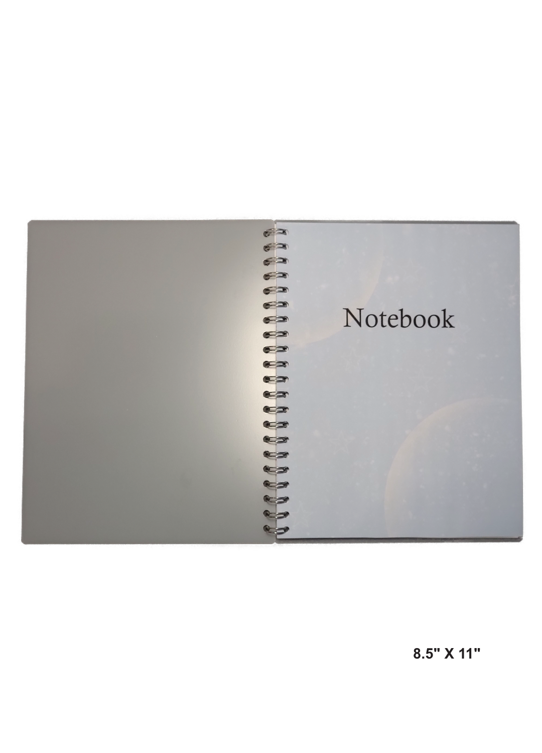 Image of hand-made 8.5" x 11" notebook with moons in two corners. The notebook's pages are lined for writing or journaling 
