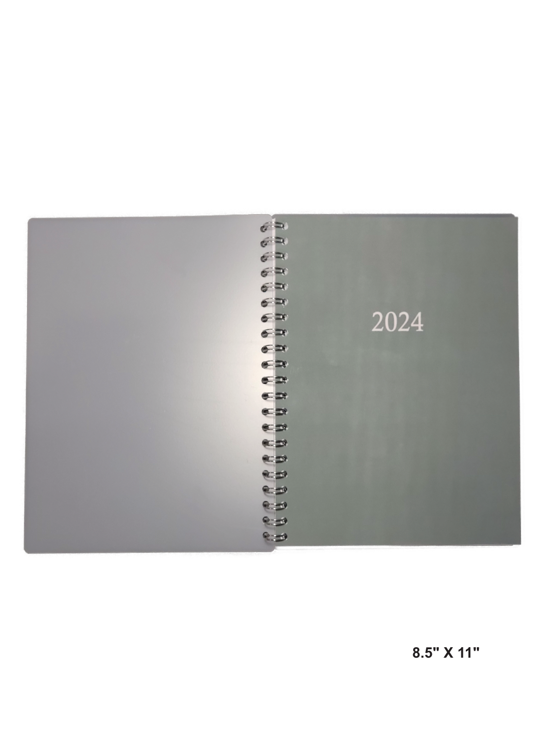 Image of a hand-made 8.5" x 11" 12 month planner with solid green cover. Great for planning and organization.