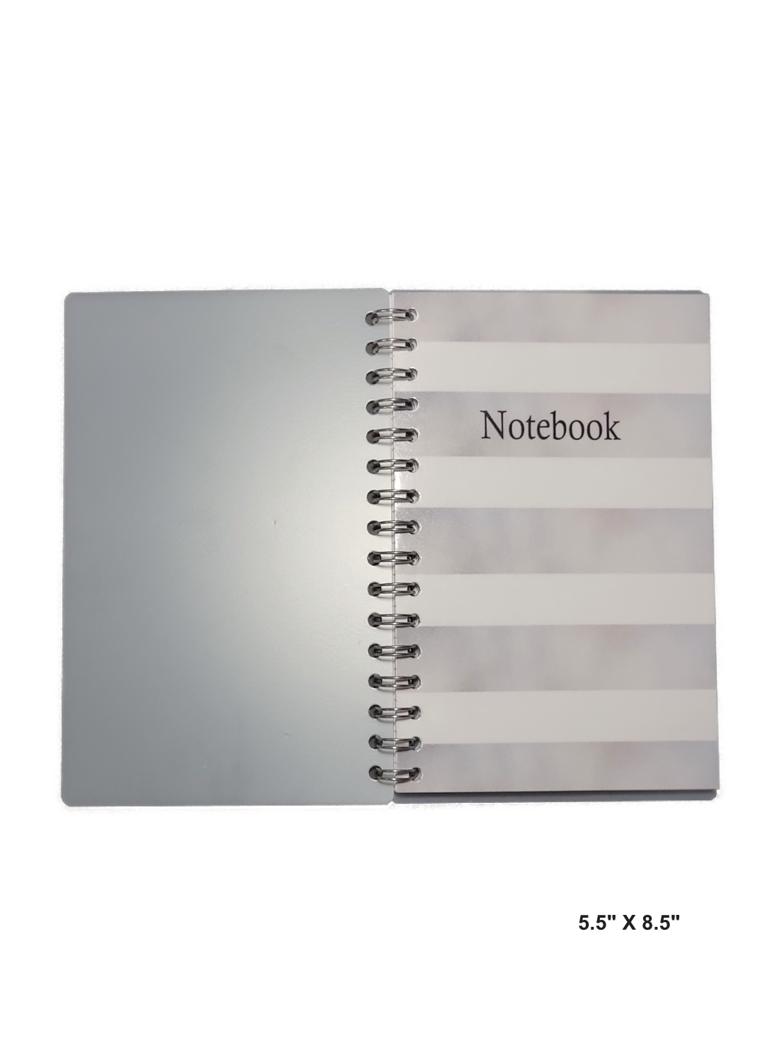 Image of hand-made 5.5" x 8.5" notebook with silver and white stripes cover. The notebook's pages are lined for writing or journaling.